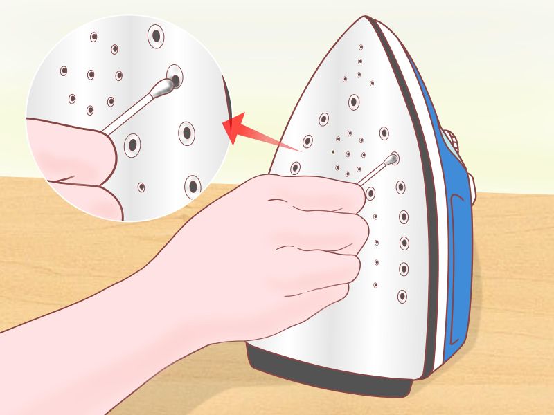 cómo limpiar los agujeros de la plancha 